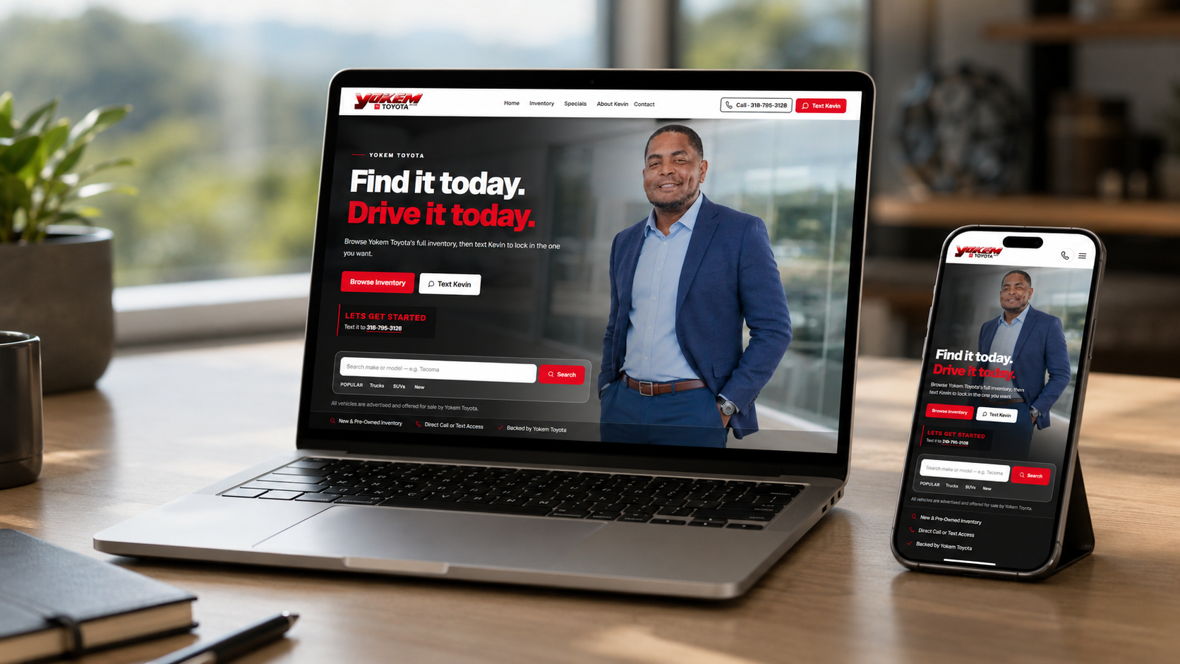 Kevin Thomas Lead2Lot Showroom website displayed on a MacBook and iPhone in a modern office